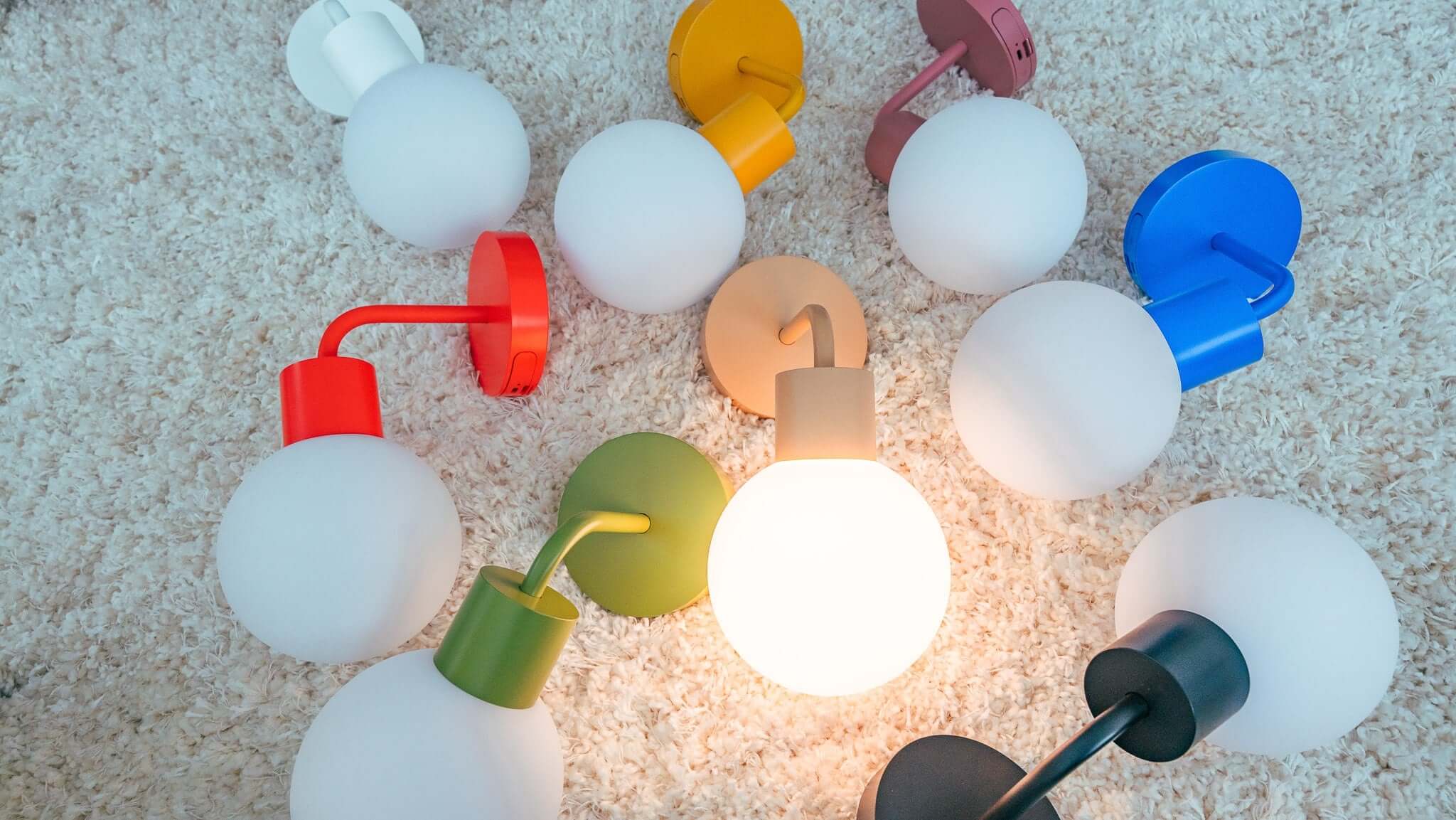 Poplight rechargeable wall light sconce in different colors that could match every renter-friendly decor and style