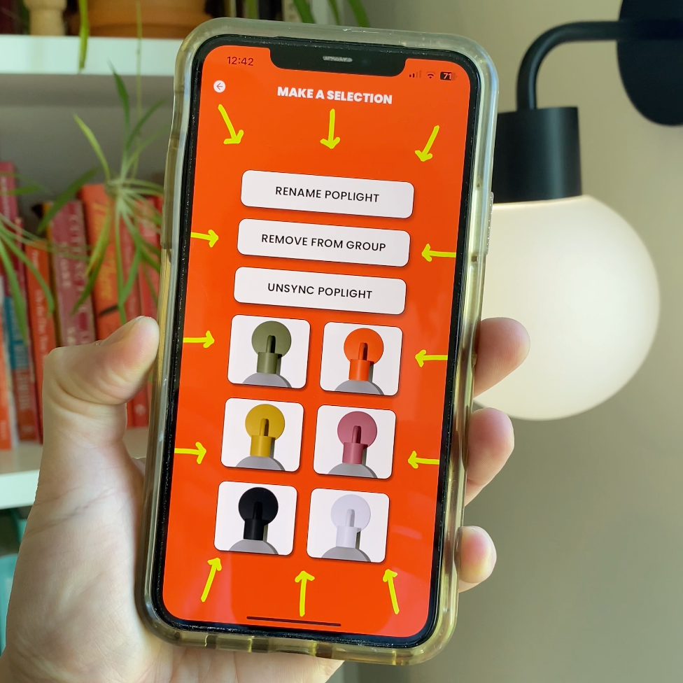 Phone screen displaying selection menu with options to rename, remove, and unsync Poplight features.