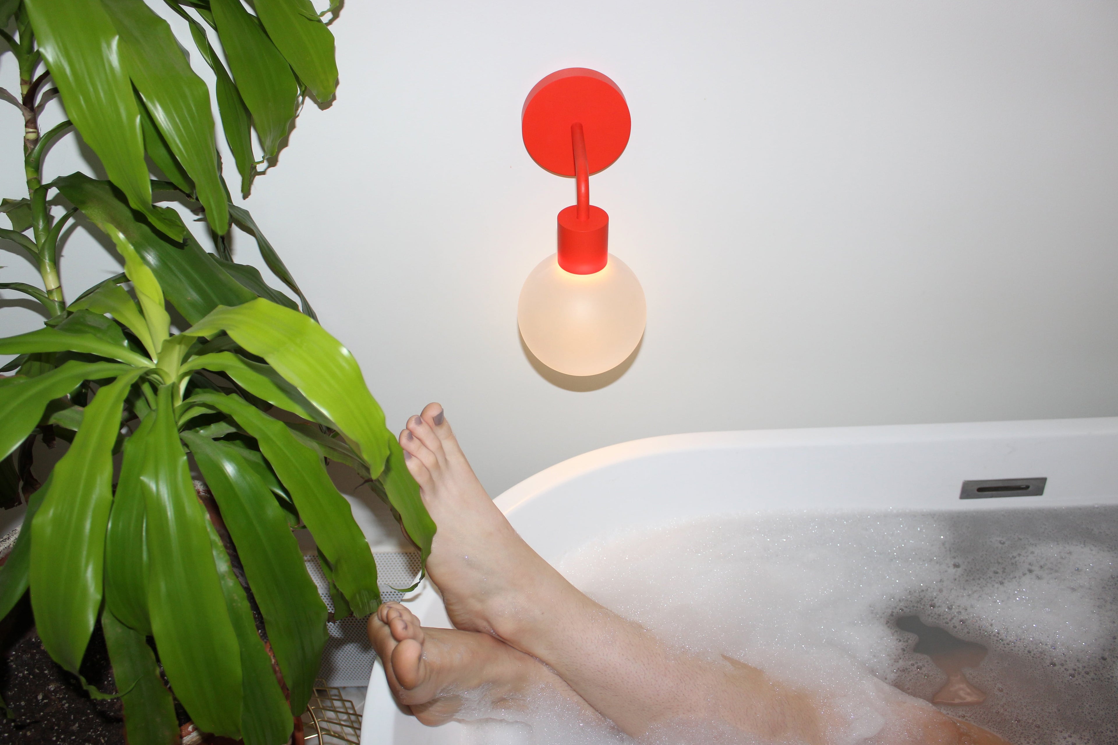 Poplight over a bathtub