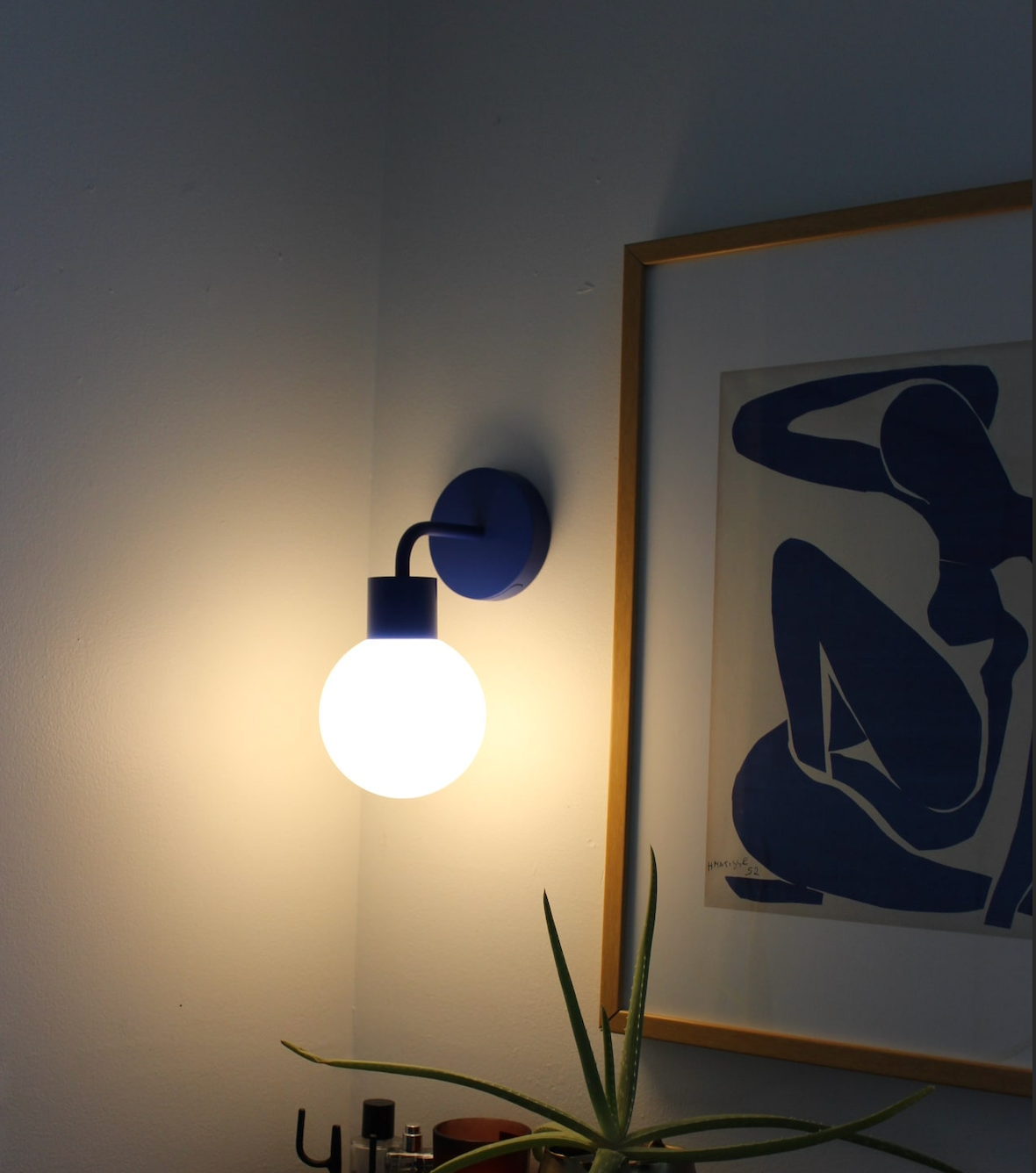 Warm lighting ambient from PL blue rechargeable wall light sconce