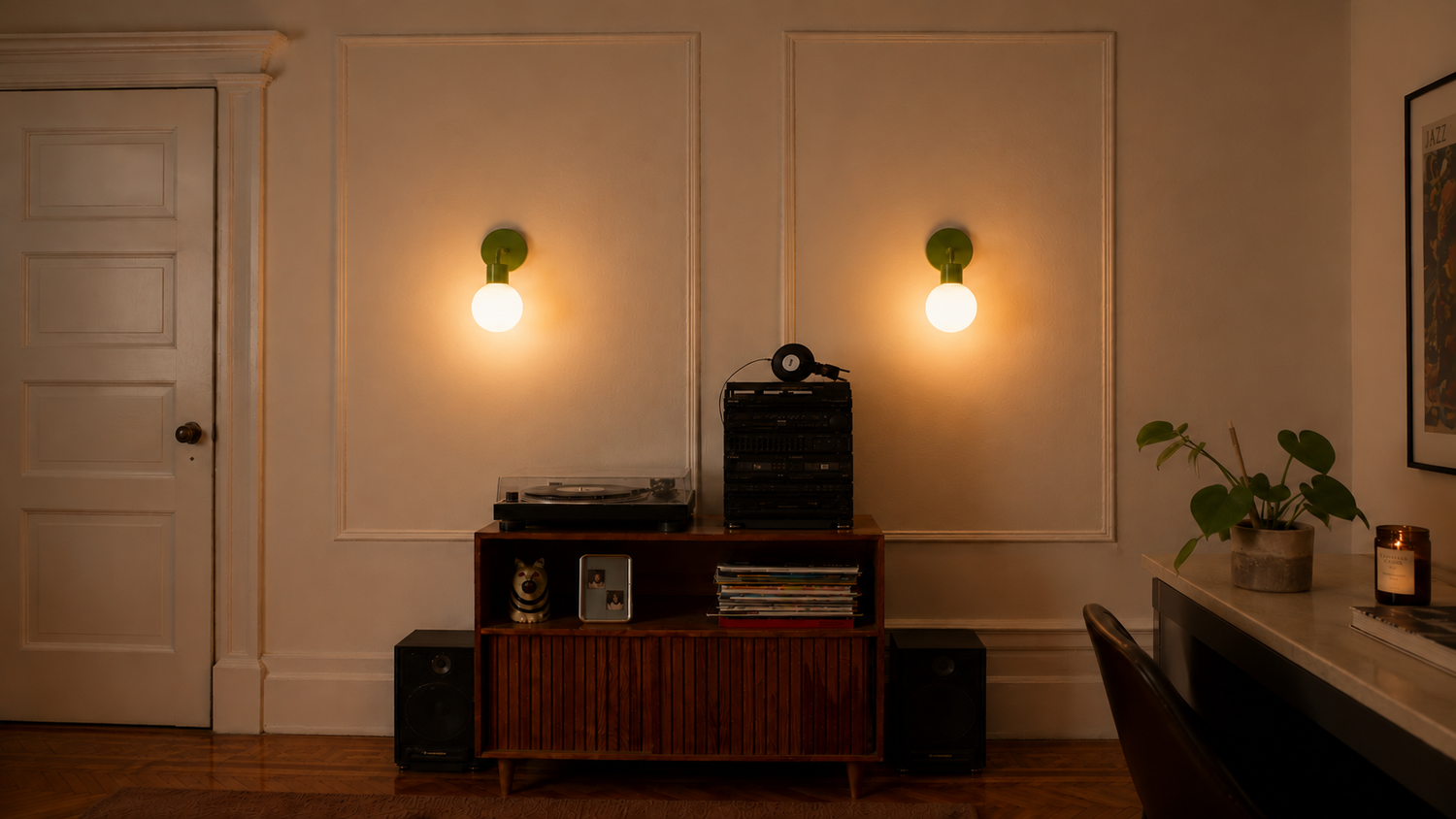 2 Poplight wall sconces in dim light 