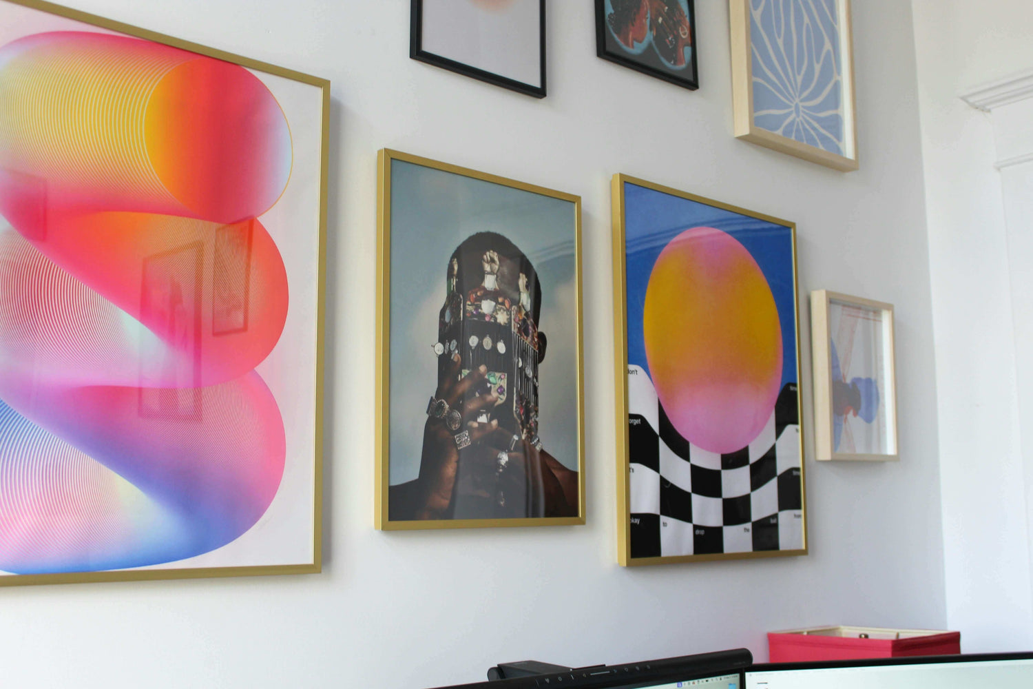Artwork pieces carefully place in a home gallery wall