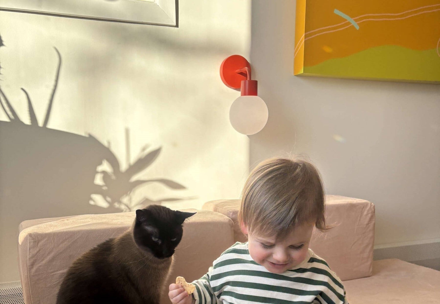 Kid friendly rechargeable wall light sconce in vermillion red