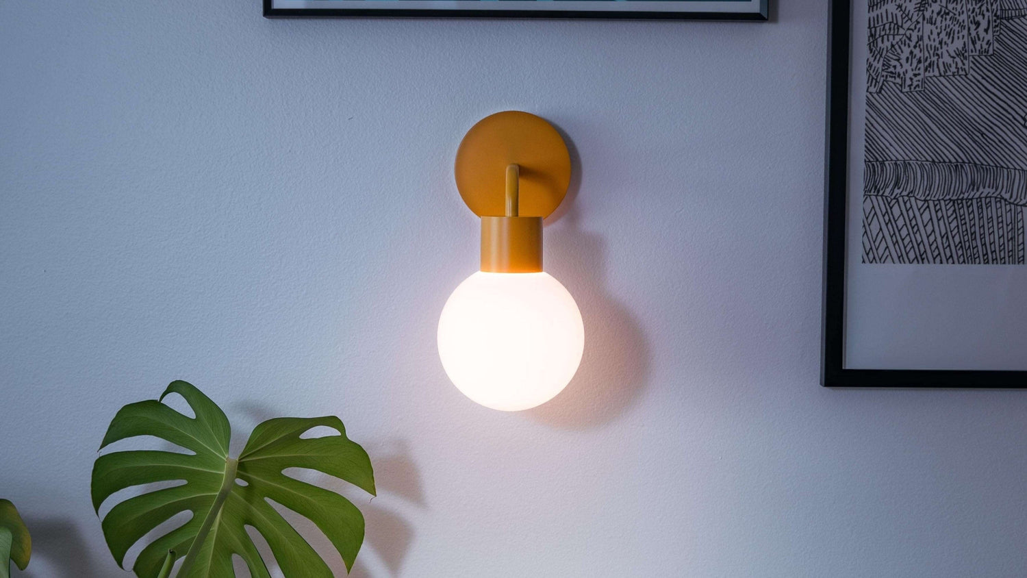 Warm ambient to a small space corner from a rechargeable wall light sconce