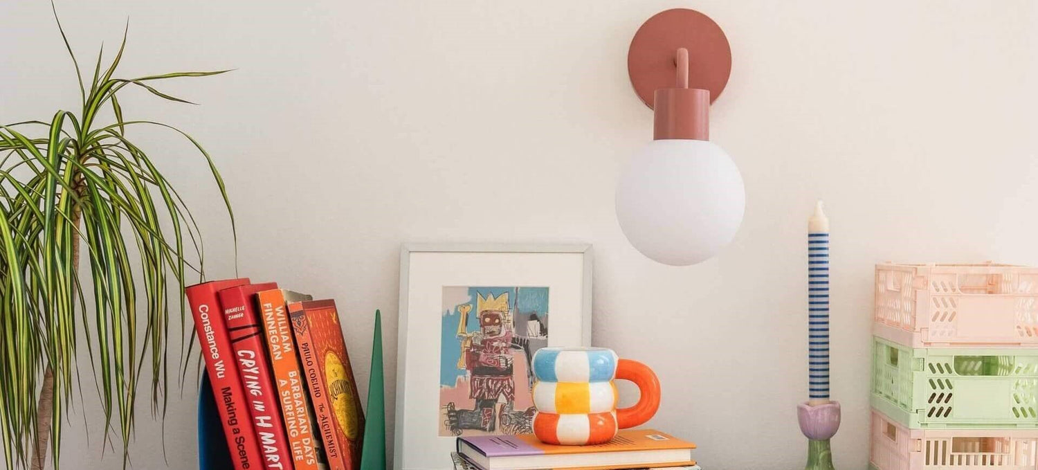 Dusty Rose rechargeable wall light sconce adds a splash of modern color to a small office space