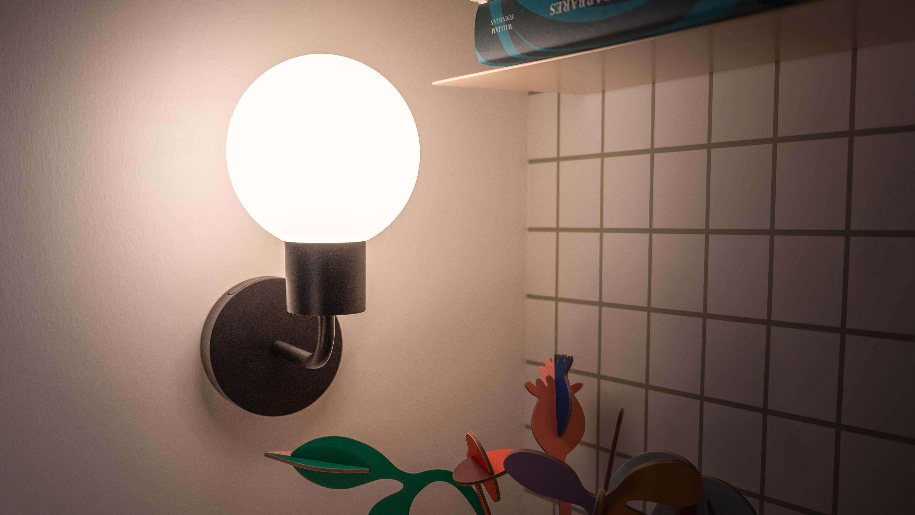 warm light ambient from PL rechargeable wall light sconce