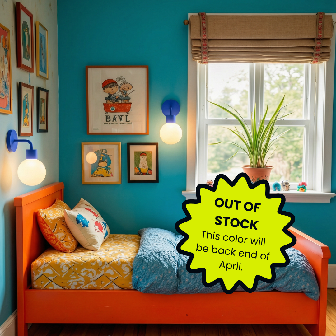 Blue LPoplight wall sconces installed in the kids&