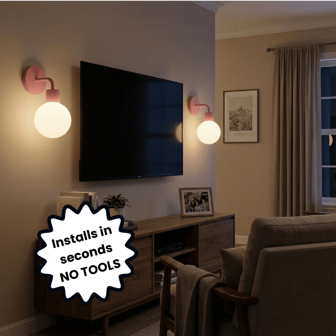 Living room with wall-mounted TV and Poplight Dusty Rose wall sonces with text overlay "Installs in seconds NO TOOLS."