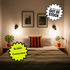 A beige-walled bedroom with a striped accent pillow, two framed photos above, illuminated with Black Poplight wall sconces, and a text graphics overlay reading "WE WILL RUN OUT OF STOCK" and "10,000+ ⭐⭐⭐⭐⭐ customers."