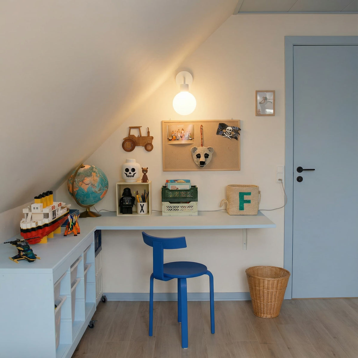Kids spae with blue chair accent and a white rechargeable wall light sconce
