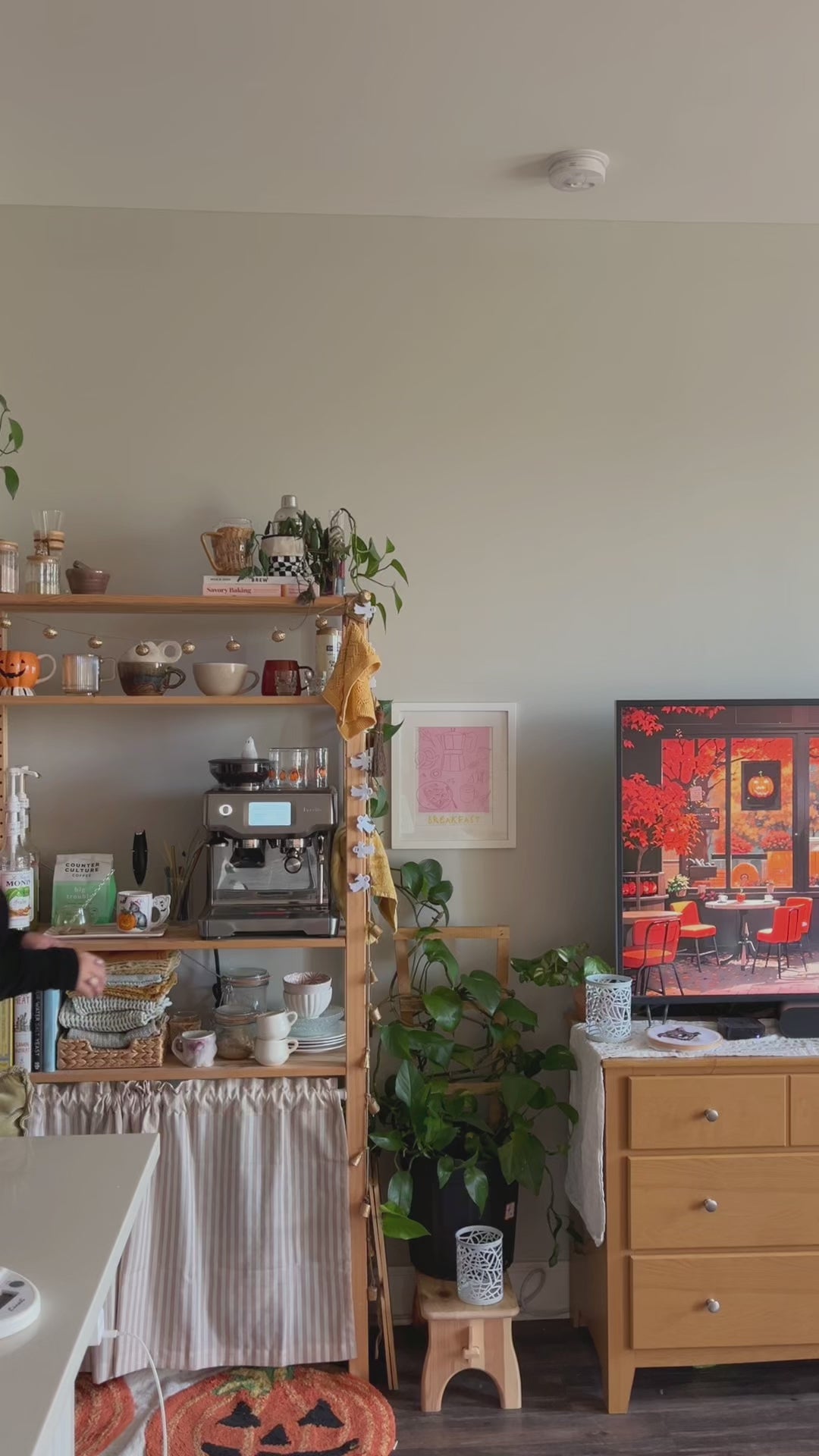 A woman in a video updating her space for a modern and relaxing ambient using PL rechargeable wall sconce