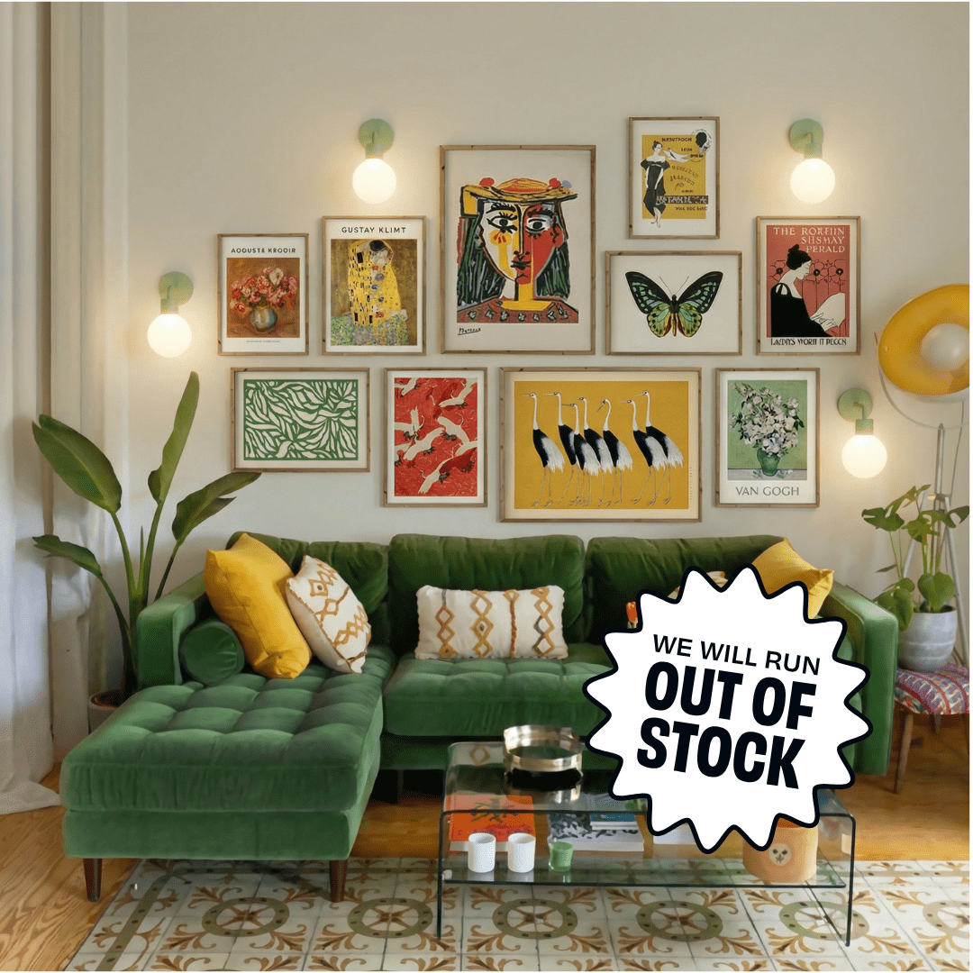 Modern living room with green velvet sofa, gallery wall of colorful art prints, Poplight Sage Green wall sconces, and yellow accent pillows